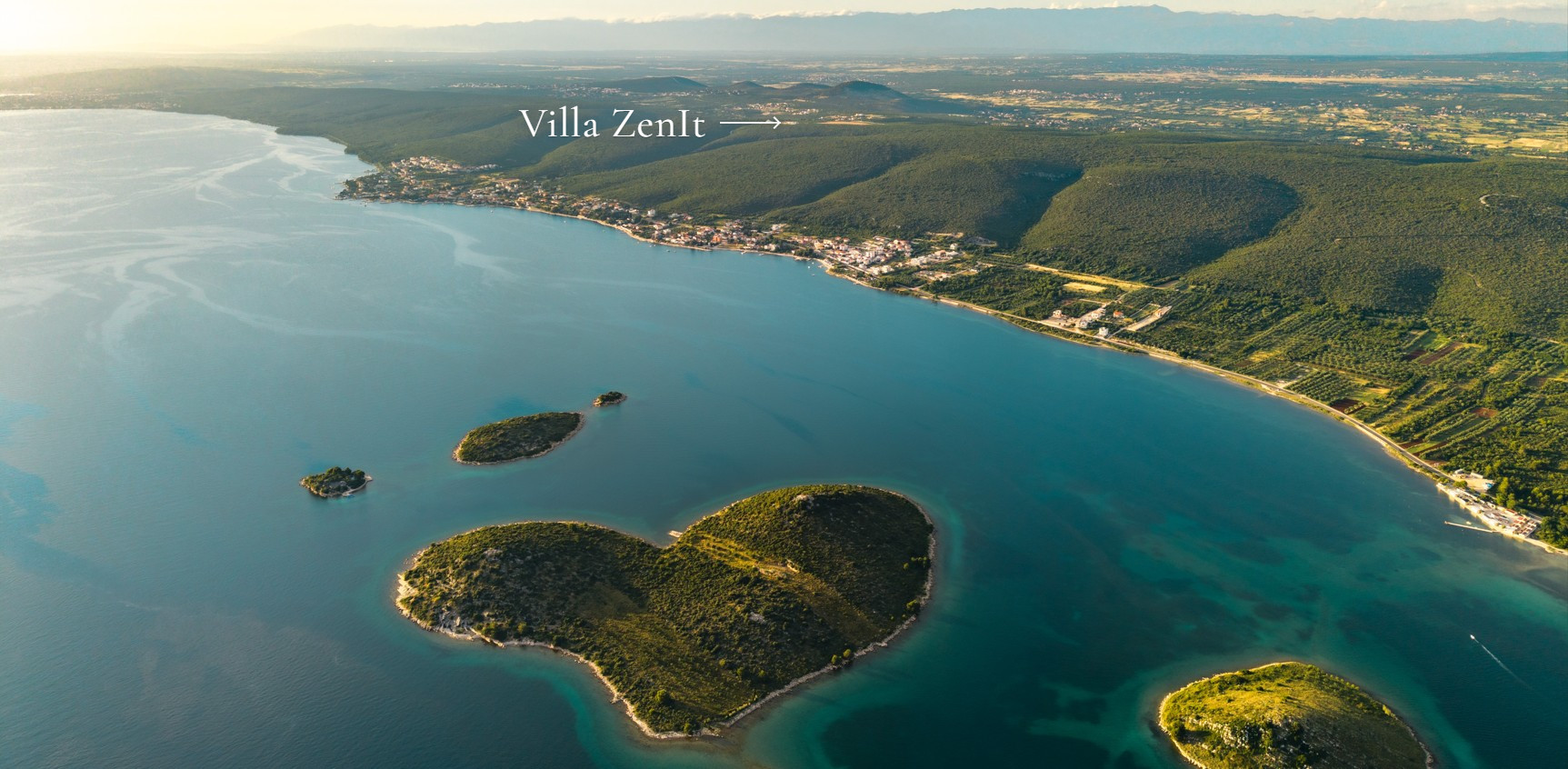 Galešnjak, the heart-shaped island, with the Villa ZenIt hilltop marked above the coast